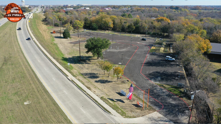 Aerial view of Dallas Melissa RV Park beside Sam Rayburn Highway, with paved roads and sites