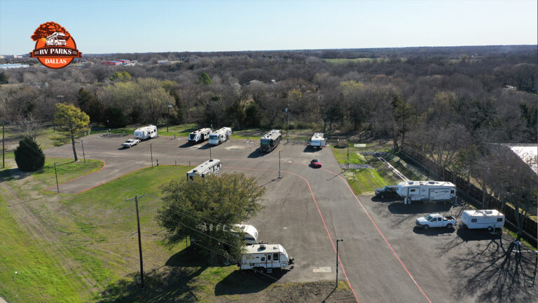 Aerial view of Dallas Melissa RV Park with RVs parked on paved sites and trees around the property
